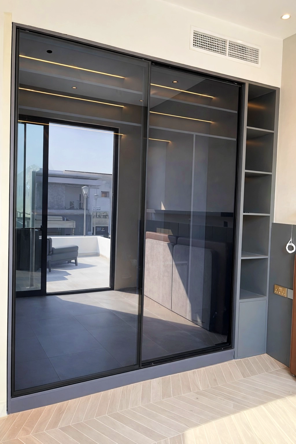 A set of folding aluminium doors.