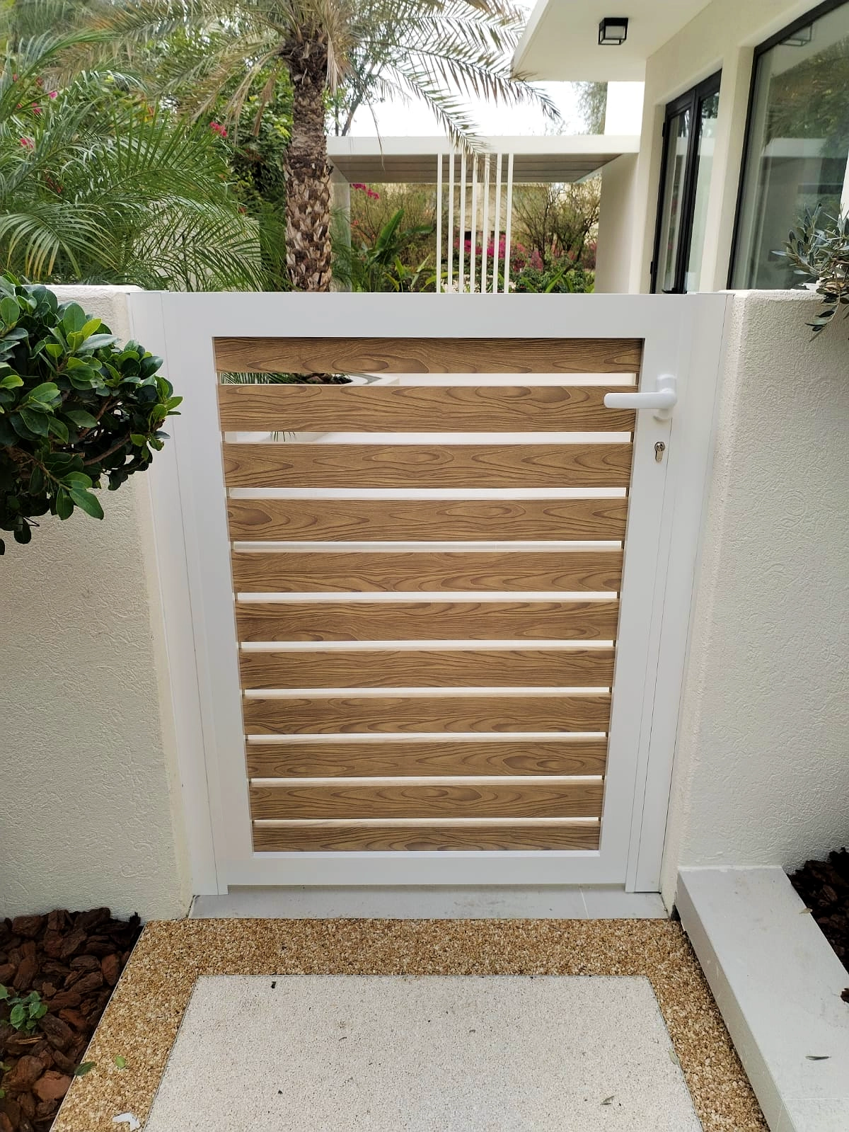 A modern and secure automated aluminium gate.