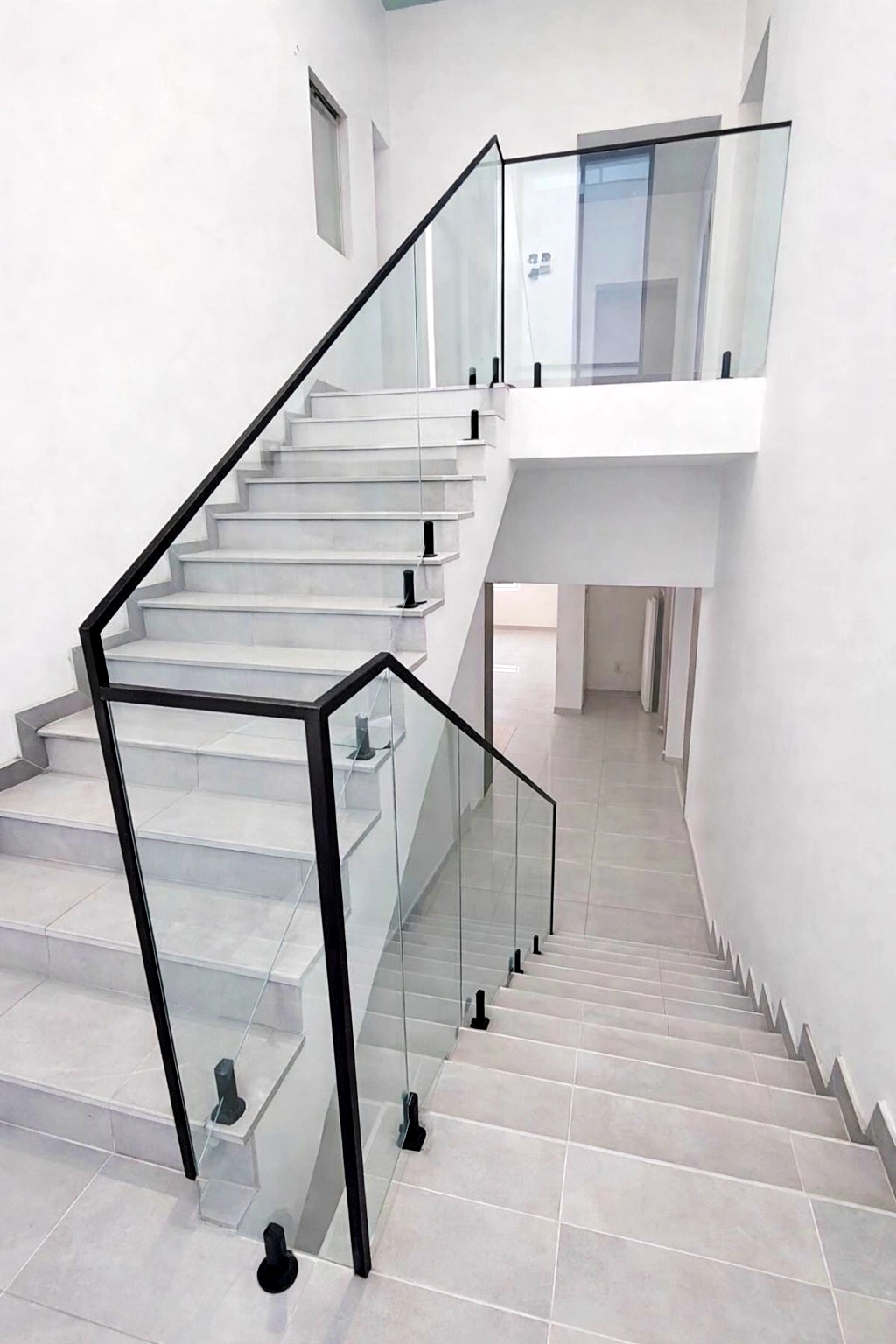 Close-up of a glass railing.
